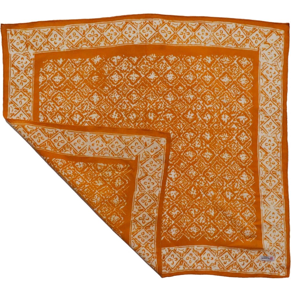 Kasih Co-op Hand Dyed Batik Bandana - Mustard (1 pc) shown with one corner folded
