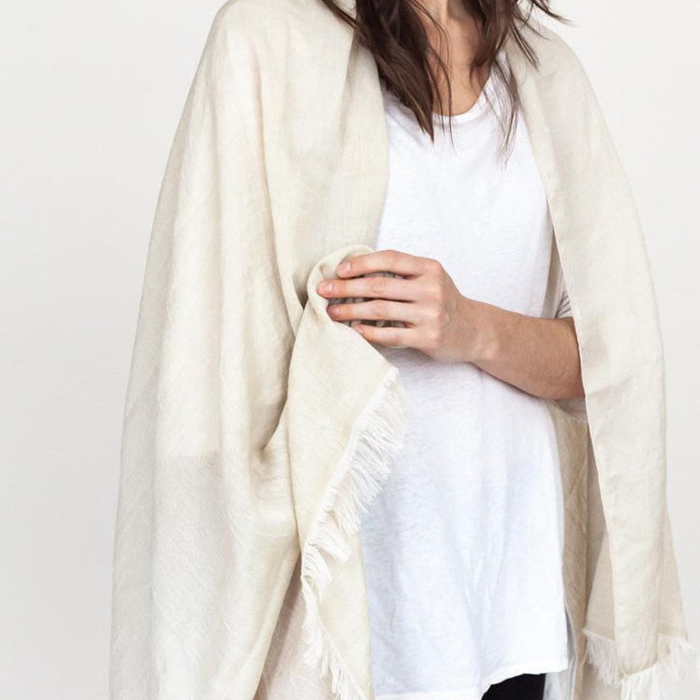 Kontex Haolu Cotton Wool Stole - Sand (1 pc) - product shown around woman's shoulders. 