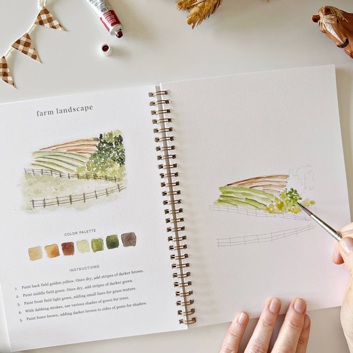 Emily Lex Studio Farm Watercolor Workbook (1 pc) - page of product shown being painted.