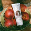 St. Meto Mother Clay Hair Recovery Treatment (4 oz)  - product shown in bowl of apples. 