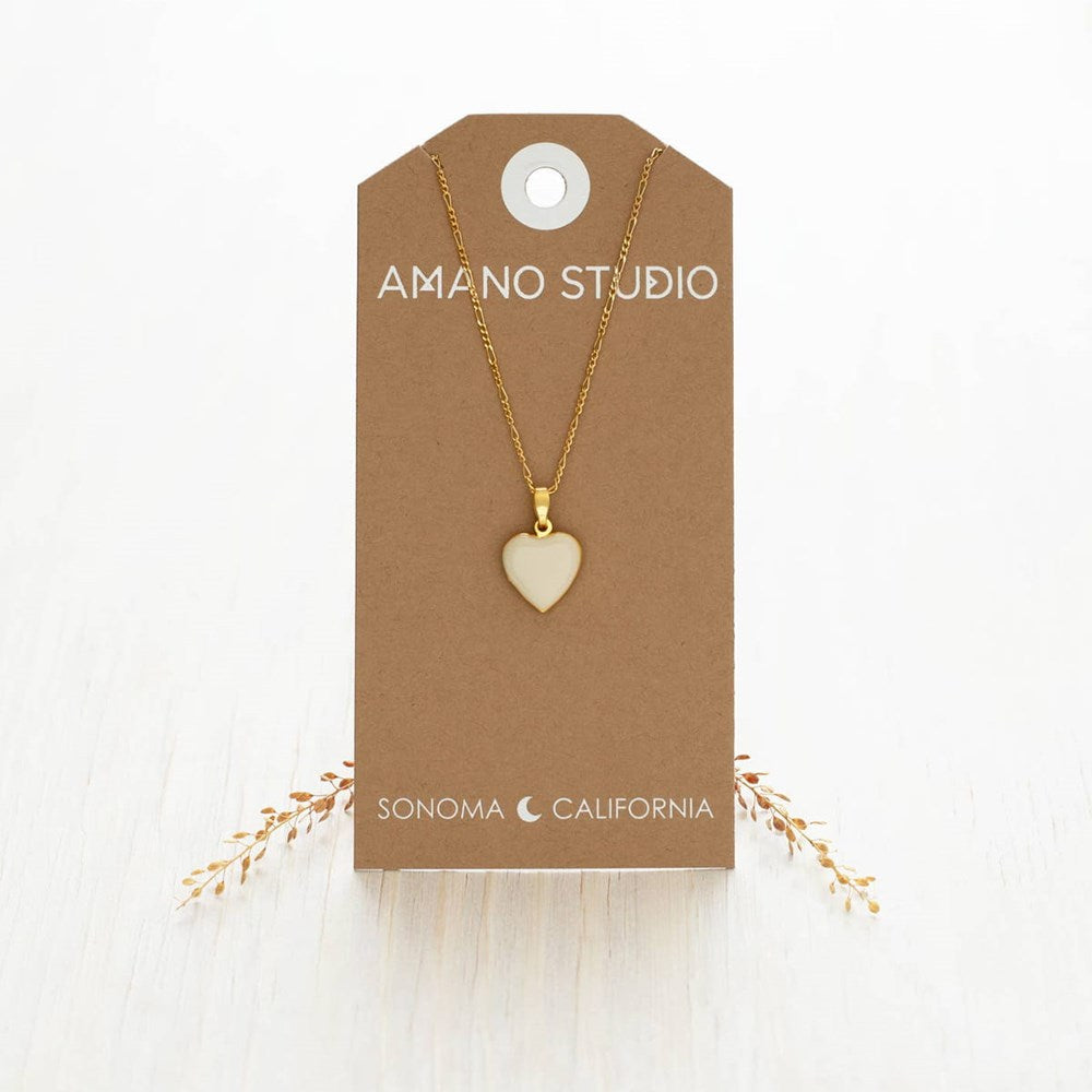Amano Studio Small Heart Enamel Locket Necklace - Beige (1 pc) - product shown in packaging. 
