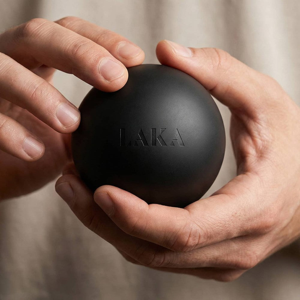 LAKA Tissue Release Ball (1 pc) - product being held by person. 
