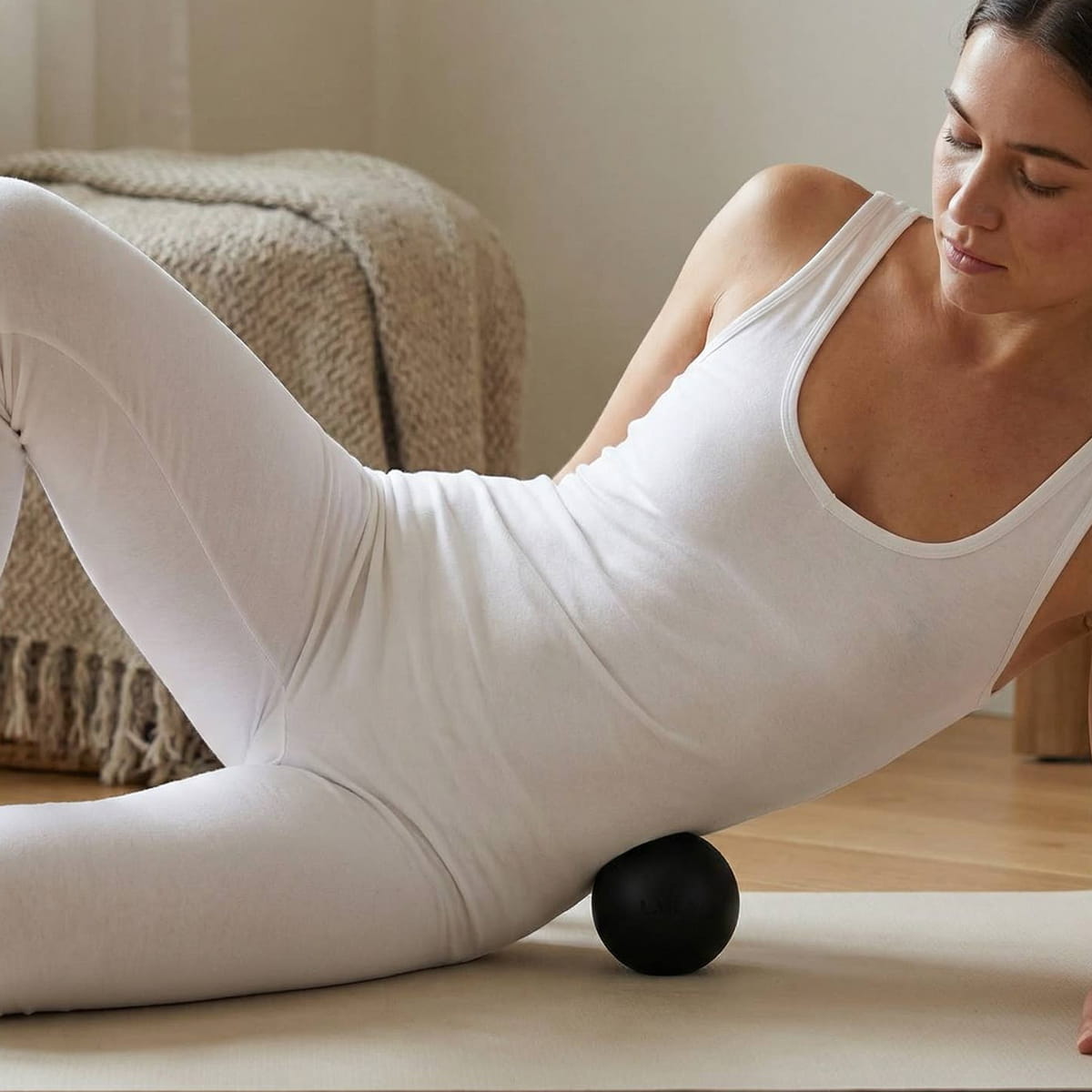LAKA Tissue Release Ball (1 pc) - product being used under woman's side.
