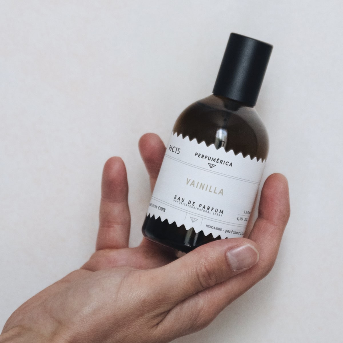 Perfumerica Vainilla Eau de Parfum (120 ml) - product shown being held. 