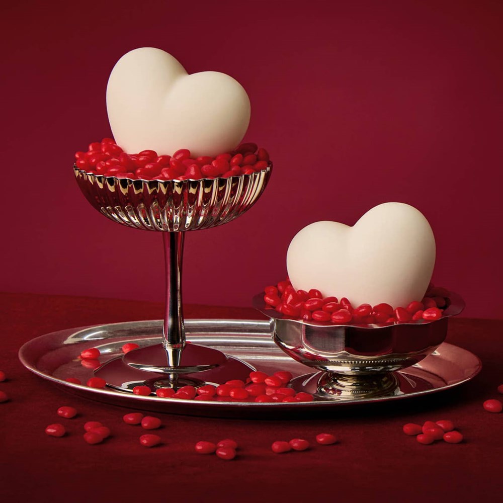 Kate McLeod Spicy Cacao Heart-Shaped Lotion Bar (3.18 oz) - product shown on metal tray in cups with red candy. 