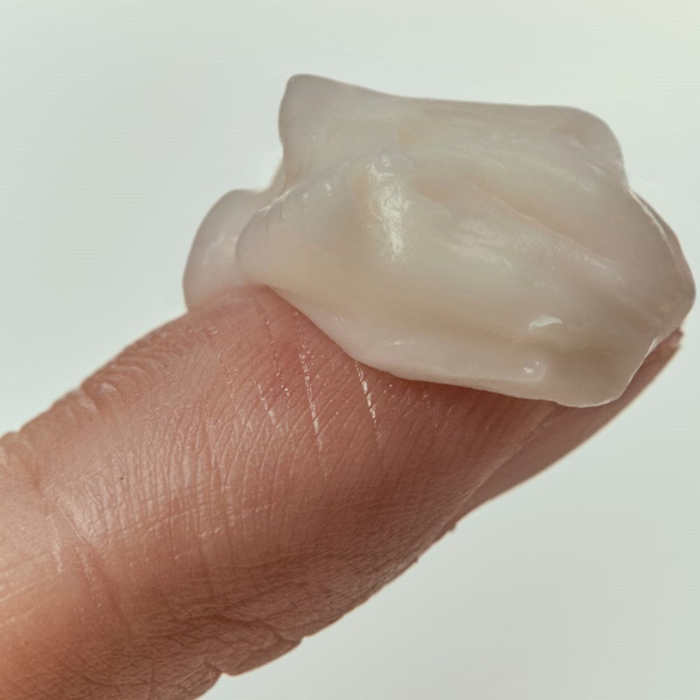 House of Balance 4:00PM Soufflé Body Butter (180 ml) - product shown on finger. 