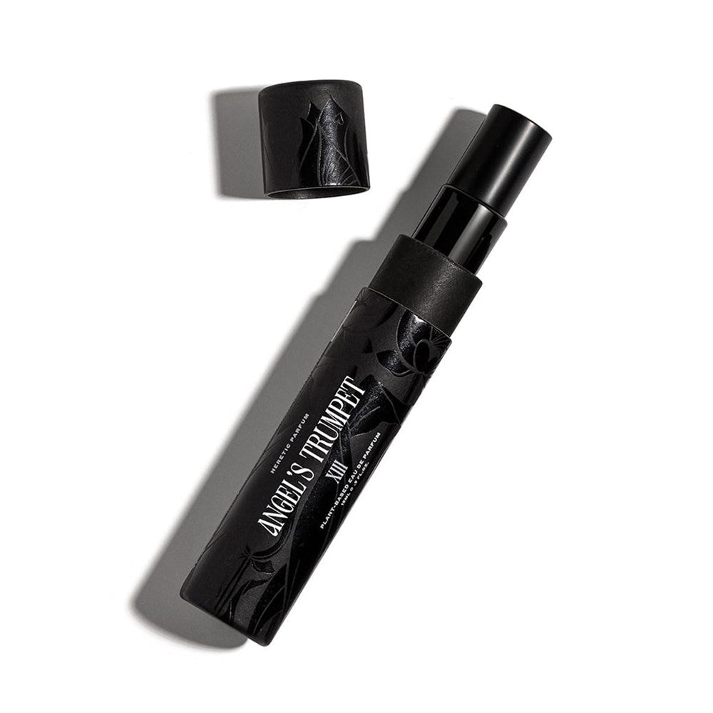Heretic Parfum Angels Trumpet Eau de Parfum (15 ml)  - product shown coming out of packaging. 