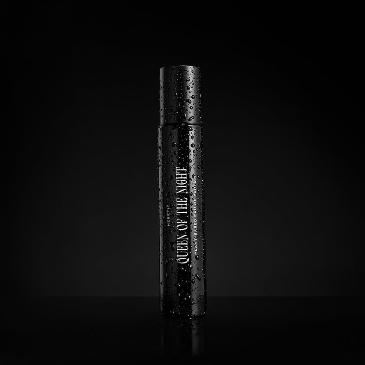 Heretic Parfum Queen of the Night Eau de Parfum (15 ml) - product shown on black background wet.
