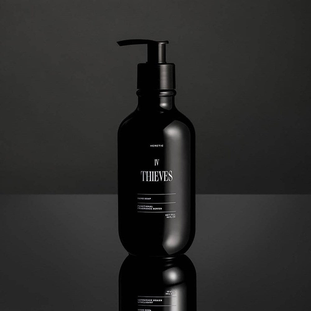 Heretic Parfum IV Thieves Hand Soap (10 oz) - product shown on black background. 