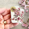 Firefly Notes Cherry Blossom & Swallow Tin - Small (1 pc) - product shown being held. 
