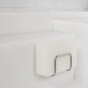Kamenoko Tawashi Sponge - White (1 pc) - product shown in soap holder (not included). 