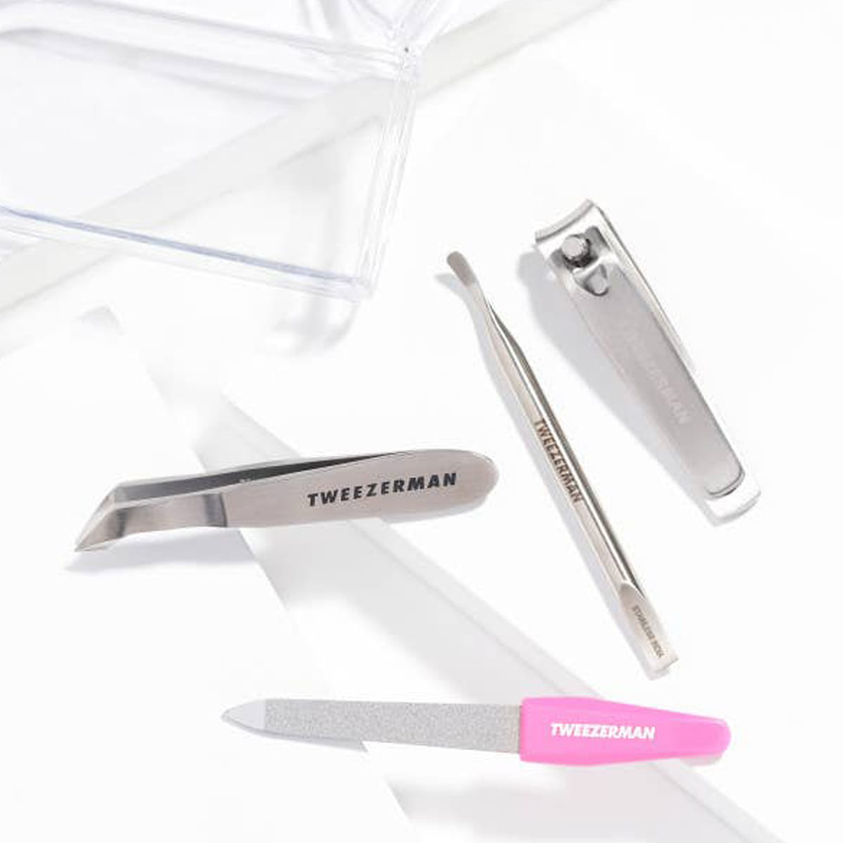 Tweezerman Mini Nail Manicure Set - Pink (5 pcs) - product shown on white table top.