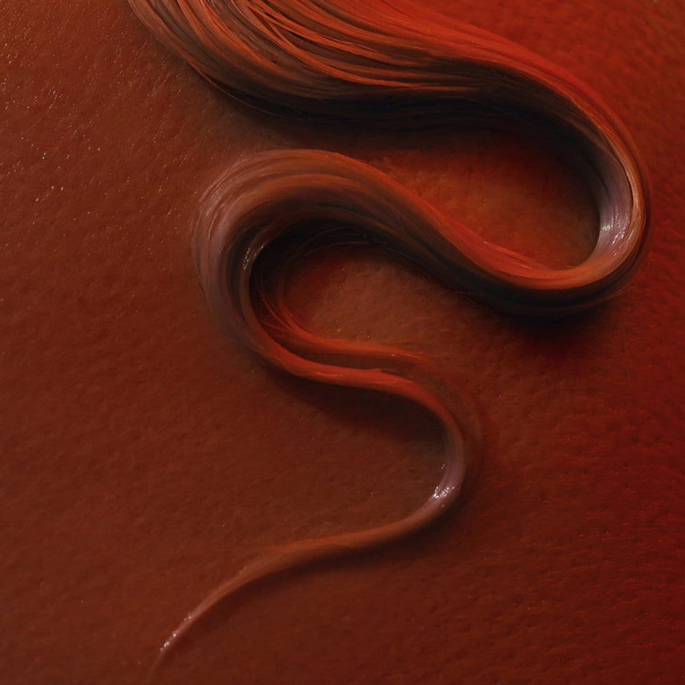 Sangre de Fruta Botanical Hair Elixir - Garden of Earthly Delights (200 ml) - product shown on hair.