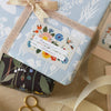 Botanica Paper Co. Botanist Gift Label Set (8 pcs) - product shown on gift wrapping. 