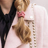 byEloise Gold Heart Silk Scrunchie - Rose Tan (1 pc) - product shown on women's hair.