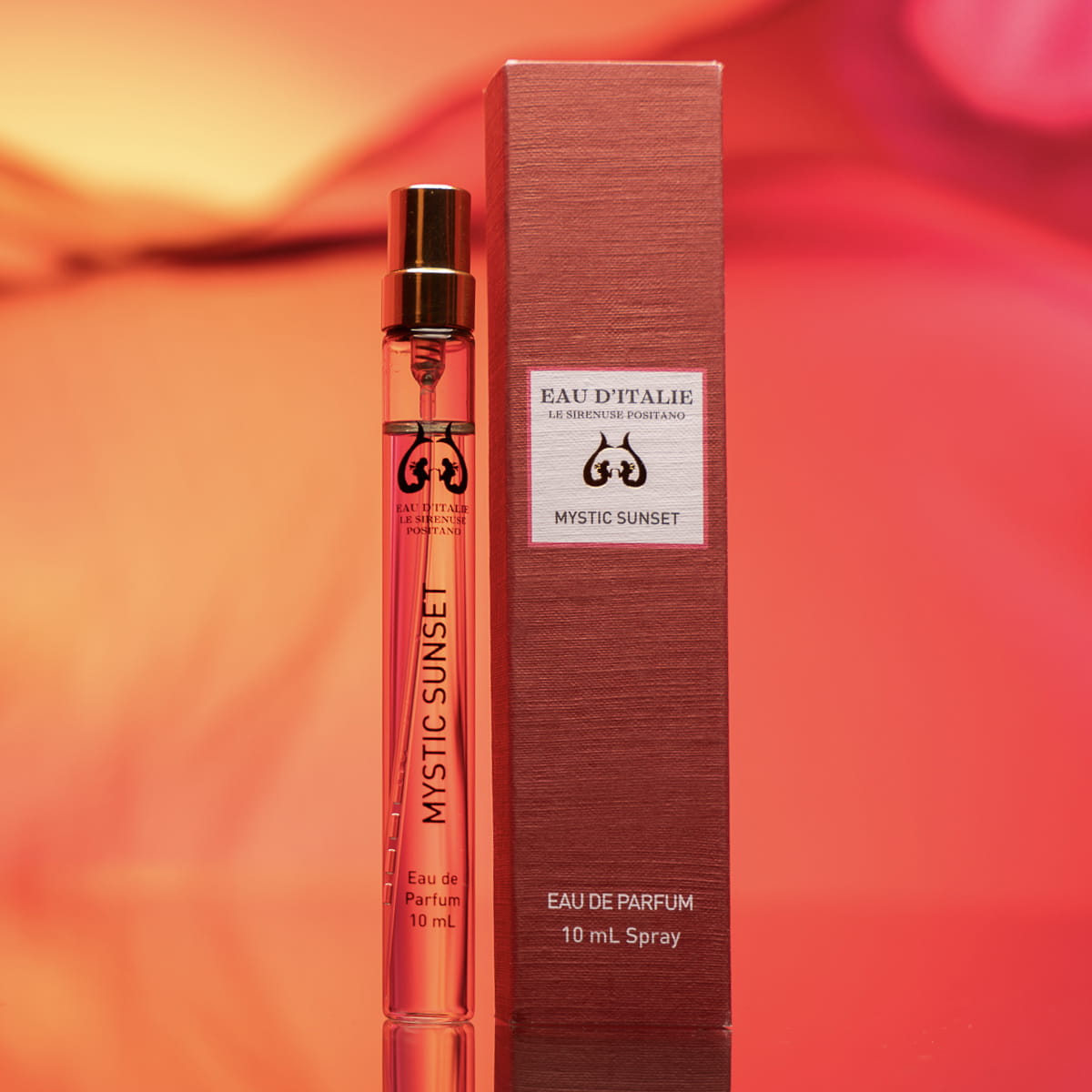 Eau d'Italie Mystic Sunset Eau de Parfum Spray (100 ml)  - product shown on red background. 
