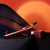 Eau d'Italie Mystic Sunset Eau de Parfum Spray (100 ml)  - product shown with packaging on black chiffon fabric. 