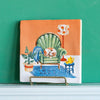 StoryTiles Small Tile - Beware of the Dog (1 pc) - product shown in holder on green wall (holder sold separately)