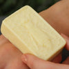 The Edinburgh Natural Skincare Company Gardener’s Solid Hand Cream Bar (50 g) - product shown being applied. 