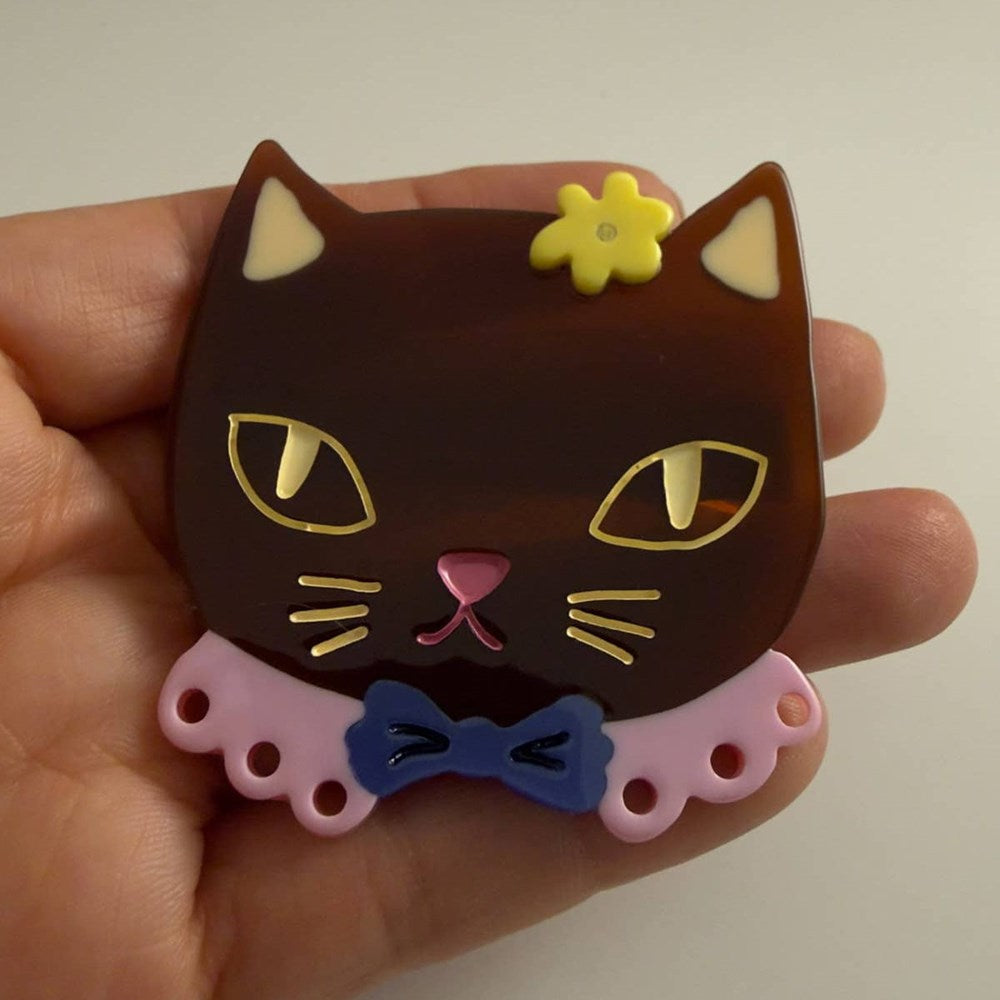 Centinelle Chat Au Chocolat Hair Clip (1 pc) - product shown being held. 