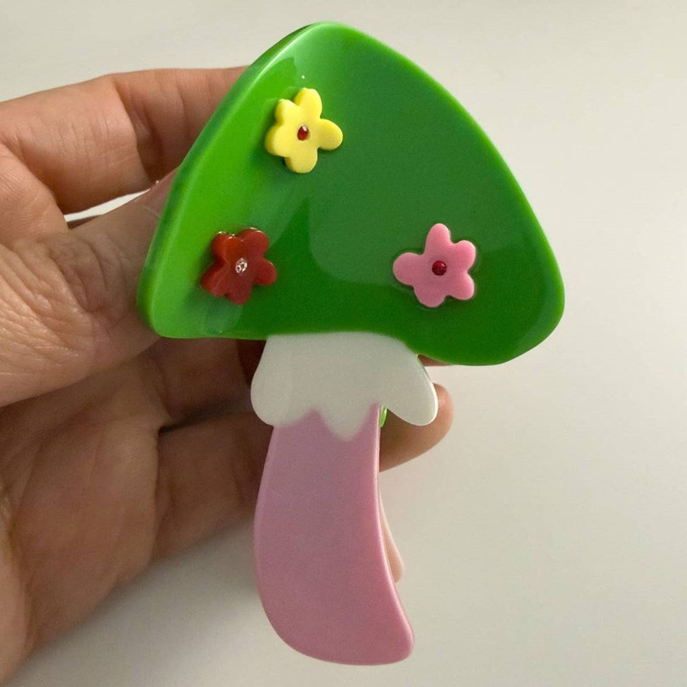 Centinelle Mushroom Floral Hair Claw (1 pc) - product shown being held on white background.