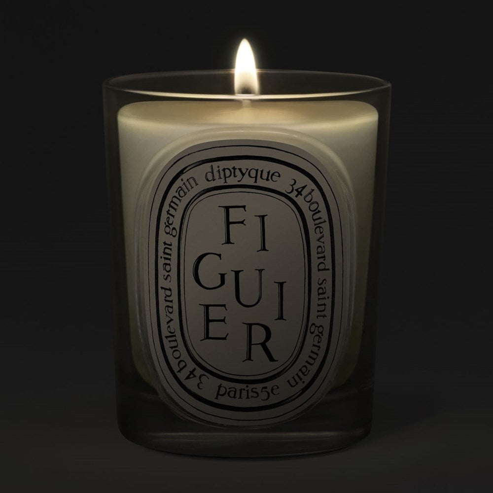 Diptyque Figuier (Fig Tree) Classic Candle (190 g) - product shown lit.