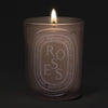 Diptyque Roses Medium Candle (300 g) - product shown lit.