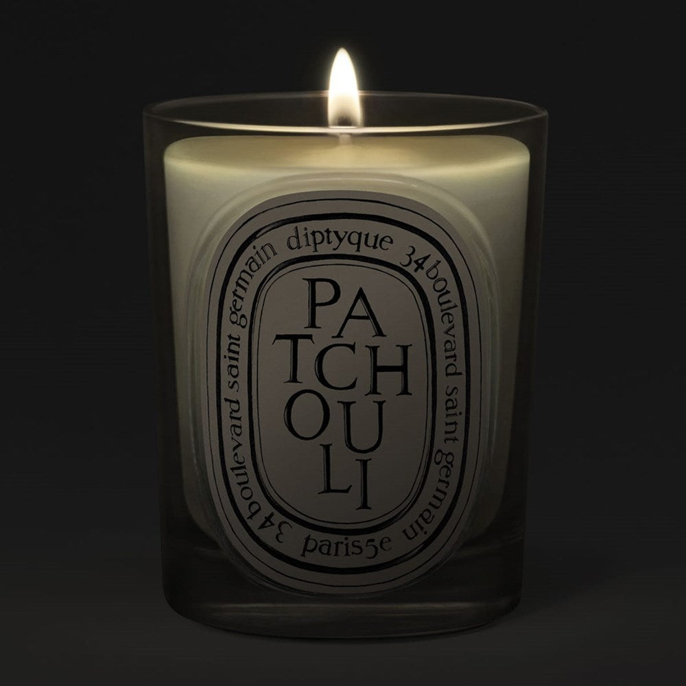 Diptyque Patchouli Classic Candle (190 g)  - product shown lit. 