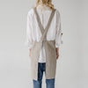 Linen Tales Linen Crossback Apron (1 pc) - back of product shown on model. 