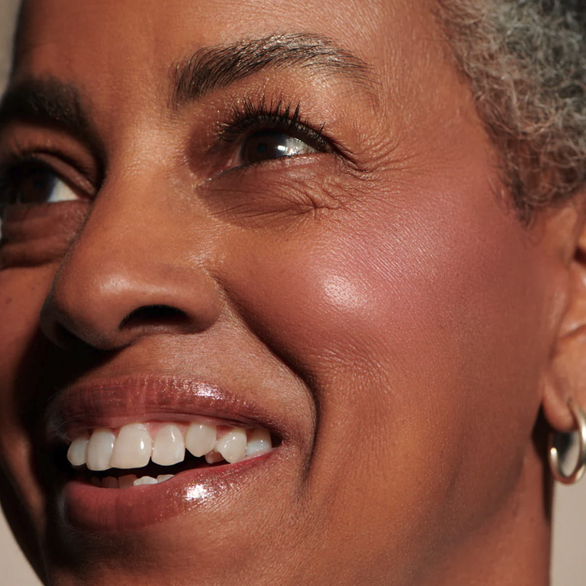 Minori Cream Blush - Sweat Pea (4.9 g) - product swatch shown on cheeks. 