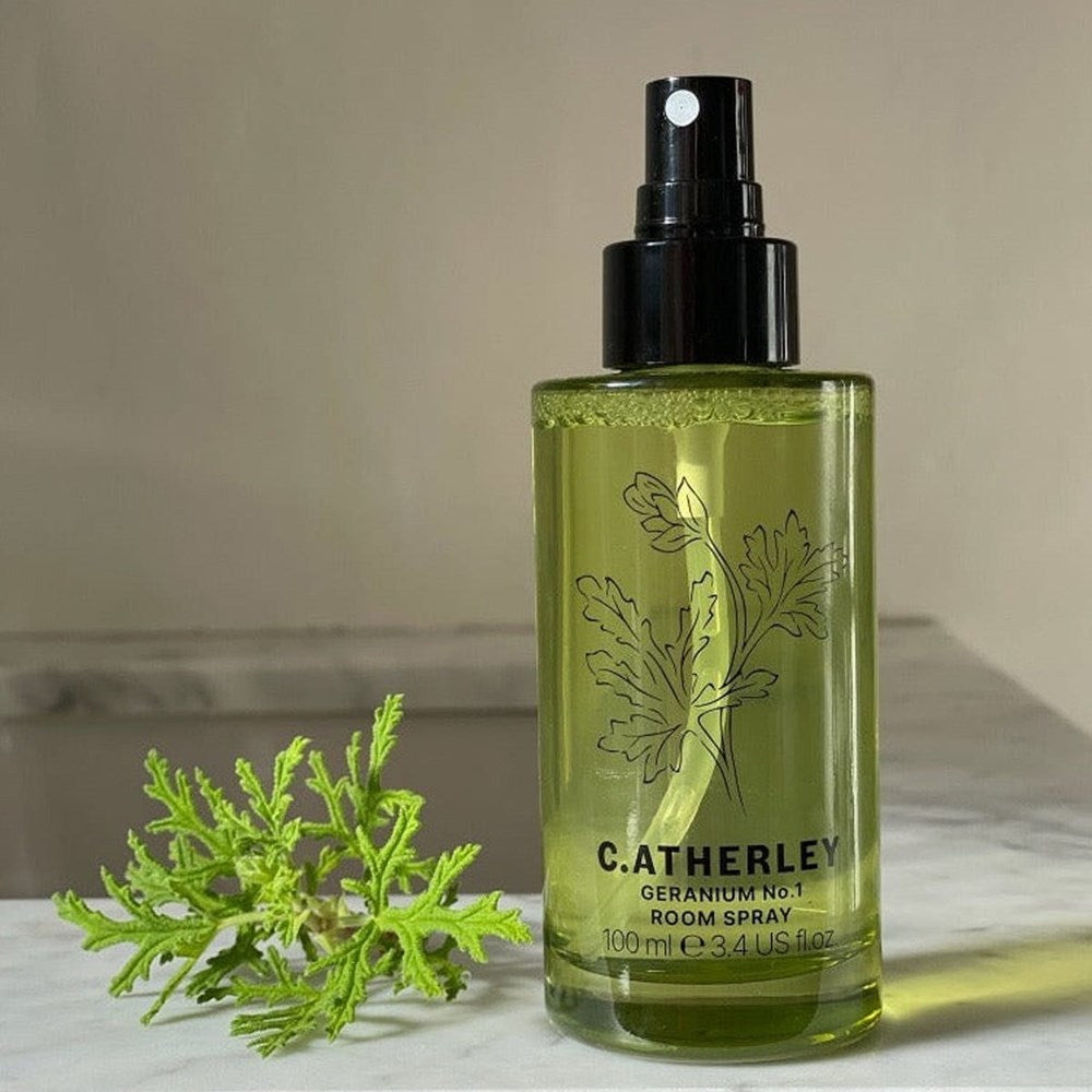C.Atherley Geranium No.1 Room Spray (100 ml) - product shown on marble counter with leaf. 