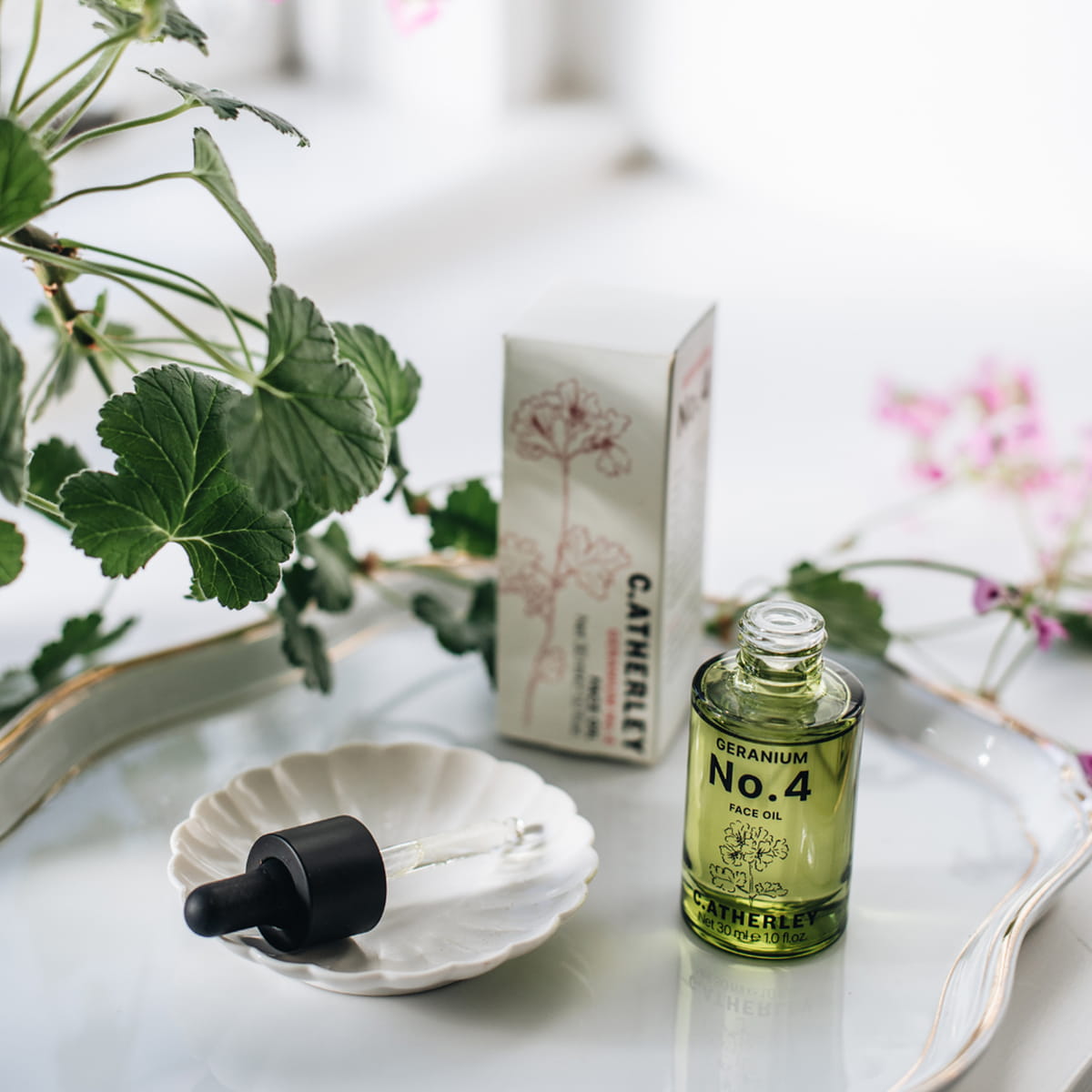 C.Atherley Geranium No.4 Face Oil (30 ml) - product shown on tray. 