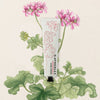C.Atherley Geranium No.4 Hand Cream (75 ml) - product shown on a tan background with a pink flower. 