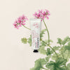 C.Atherley Geranium No.4 Hand Cream (30 ml) - product shown on a tan background with pink flowers.
