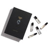 Heretic Parfum Rhubarb Thief Discovery Set (5 x 2 ml) - product shown on white counter. 