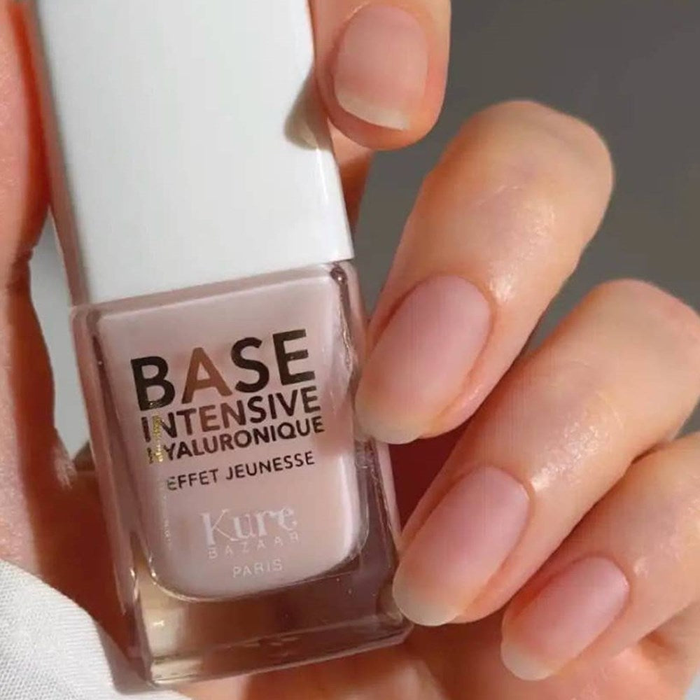 Kure Bazaar La Base Intensive Hyaluronique (10 ml) - product shown being held. 