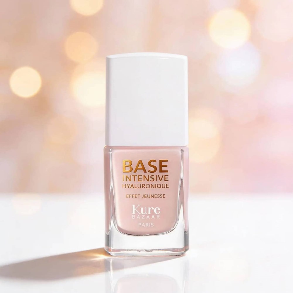 Kure Bazaar La Base Intensive Hyaluronique (10 ml) - product shown on white counter top with pink background.