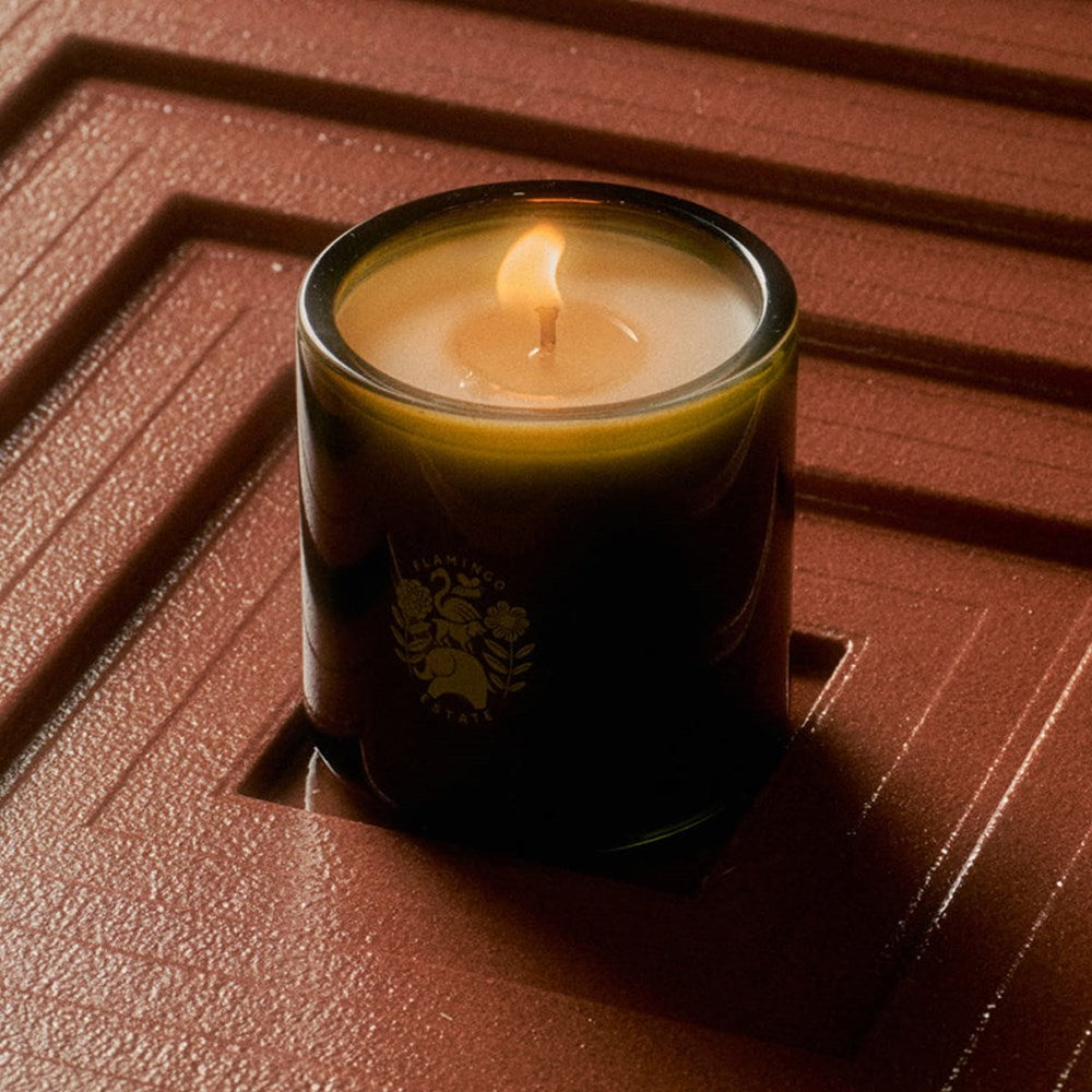 Flamingo Estate Organics Golden Pollinator Candle (226 g) shown burning