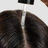 Cosmetics 27 Hair & Scalp Serum (50 ml) - product shown being applied to hair & scalp. 