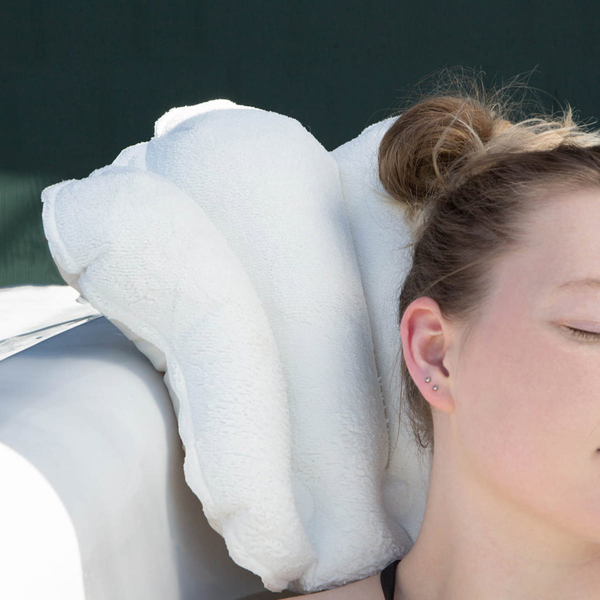 Urbana Spa Prive Microfibre Bath Pillow (1 pc) - product shown being used by women. 