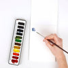 Emily Lex Studio Watercolor Paper (12 pcs) - product shown on white background with paintbrush and paint. 