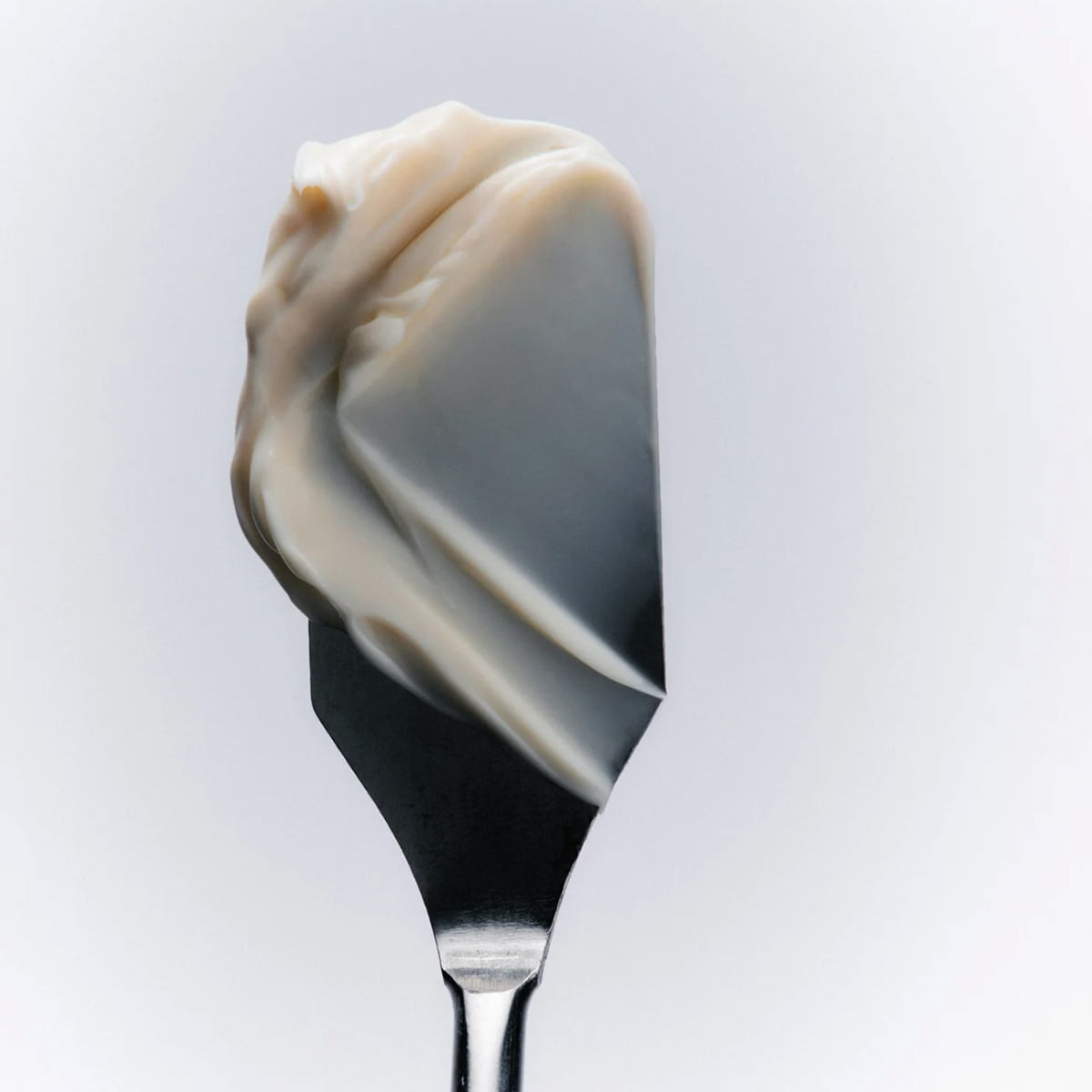 Flamingo Estate Oaxacan Apple Banana Body Balm (100 ml) - product shown on spatula.