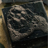 Flamingo Estate Lavender Activated Charcoal Soap Brick (340 g) - product shown up close.