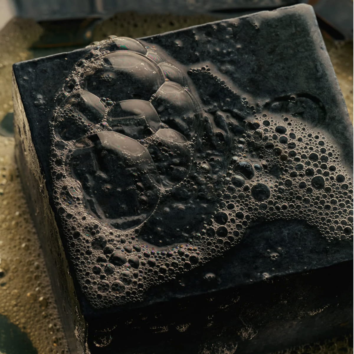 Flamingo Estate Lavender Activated Charcoal Soap Brick (340 g) - product shown up close.