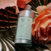 Flamingo Estate Jasmine Damask Rose Hand Soap (355 ml) - product shown next to roses.