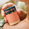 Kate McLeod The Bug Balm Moisture Stick (1.8 oz) - product shown being applied to shoulder. 