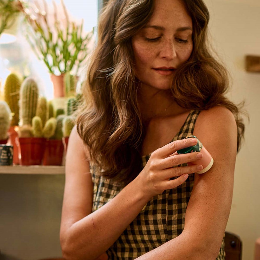 Kate McLeod The Bug Balm Moisture Stick (1.8 oz) - product shown being applied to arm. 