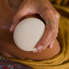 Kate McLeod The Bug Balm Lotion Bar (3.5 oz) - product shown being applied to shoulder.