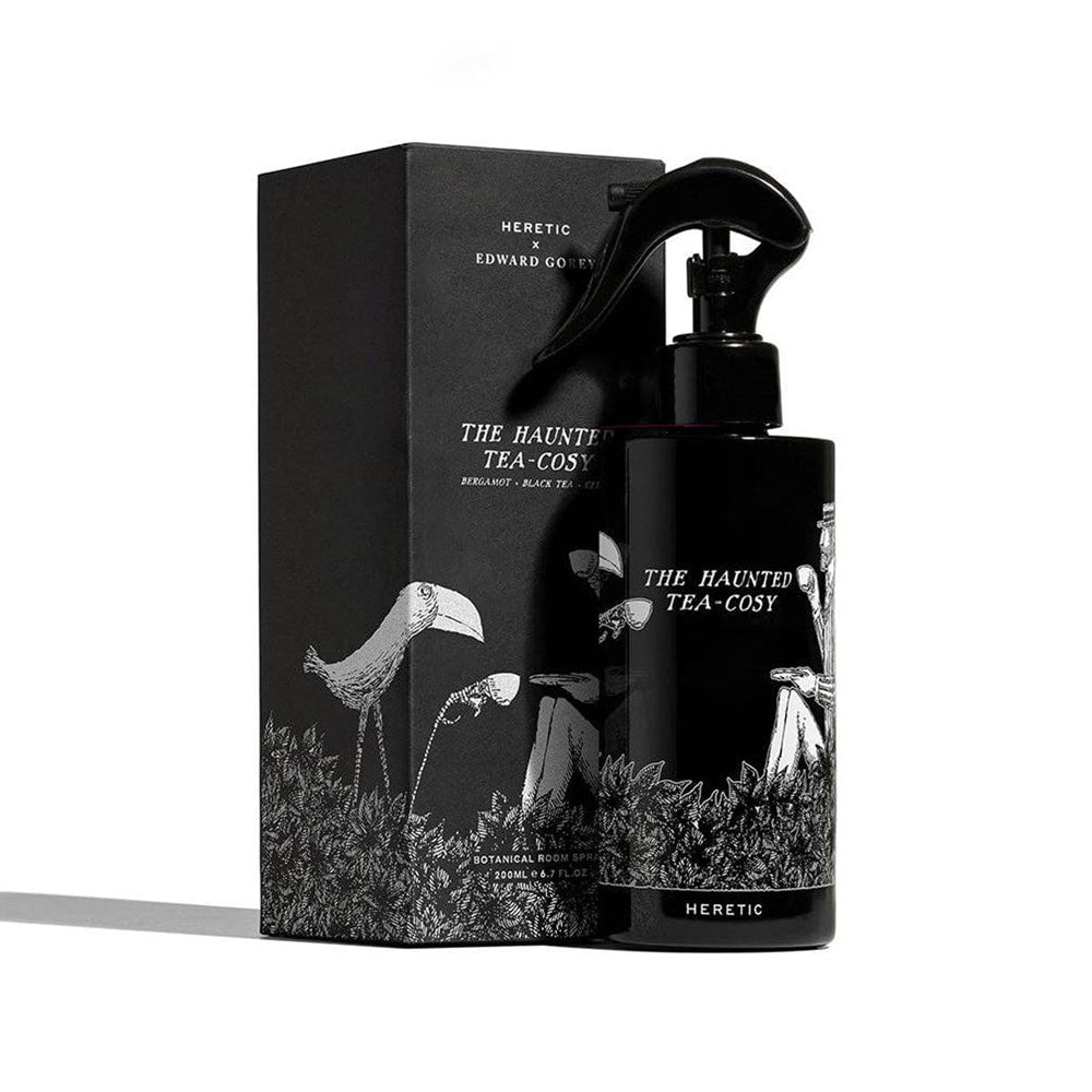 Heretic Parfum The Haunted Tea-Cosy Room Spray (200 ml) - product shown next to packaging. 
