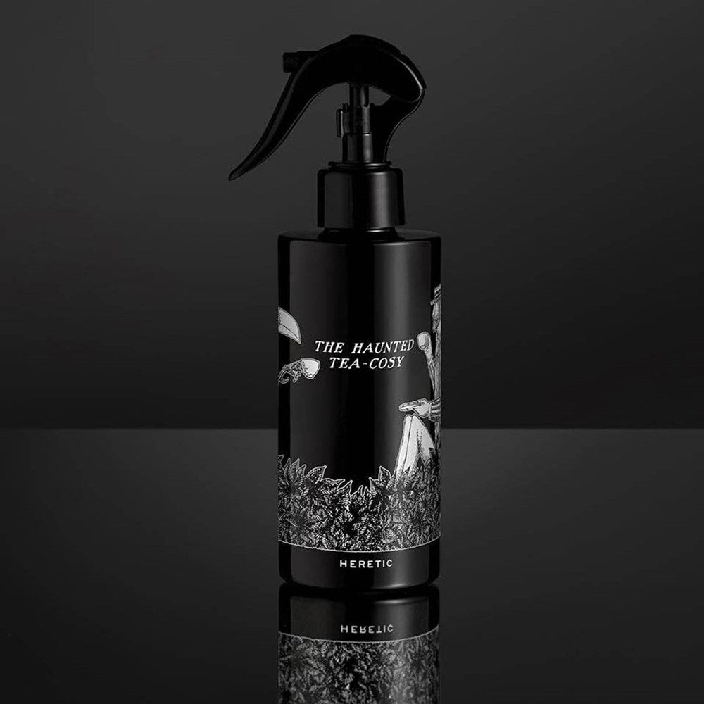 Heretic Parfum The Haunted Tea-Cosy Room Spray (200 ml) - product shown on black background. 
